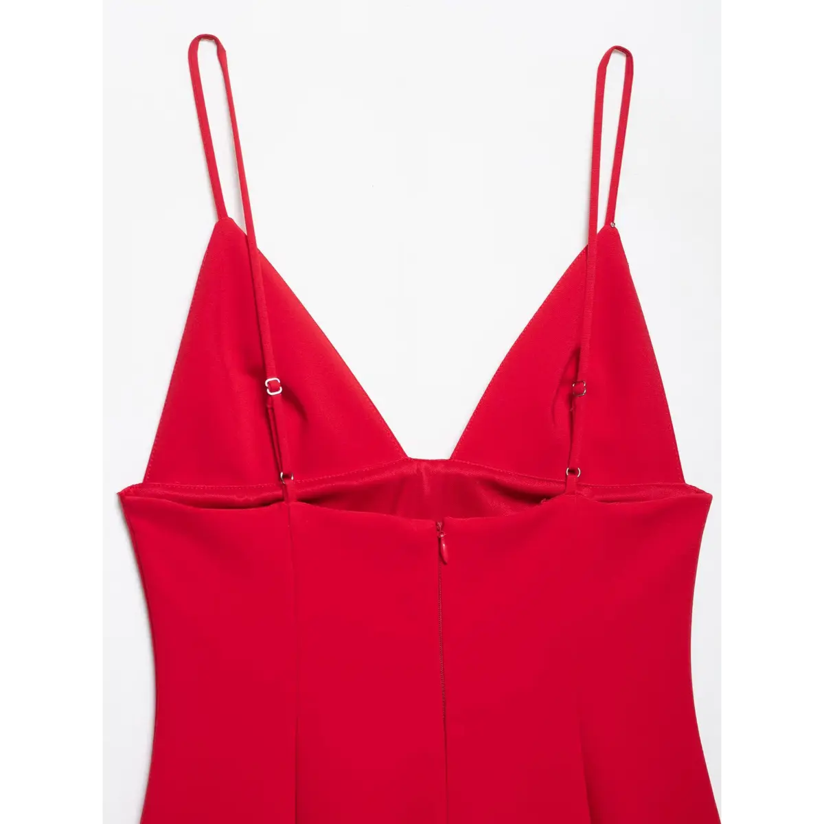 Back view of the dress, showing the center zipper and adjustable spaghetti straps.