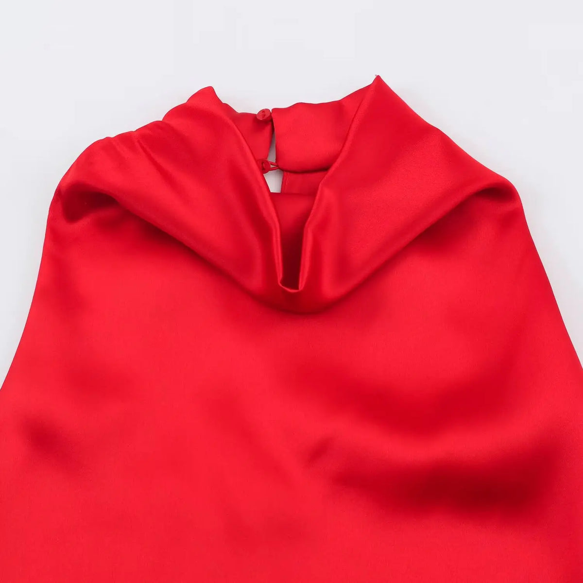 Close-up of cowl neckline and back neck buttons