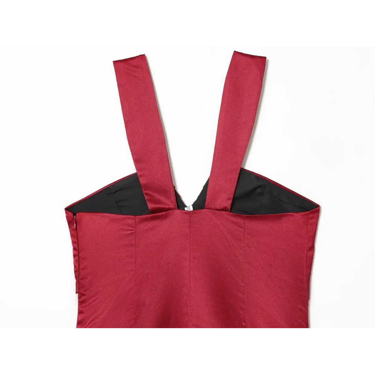 Close-up view of the back neckline on a red satin mini dress, showing the zipper, black lining, and wide straps.