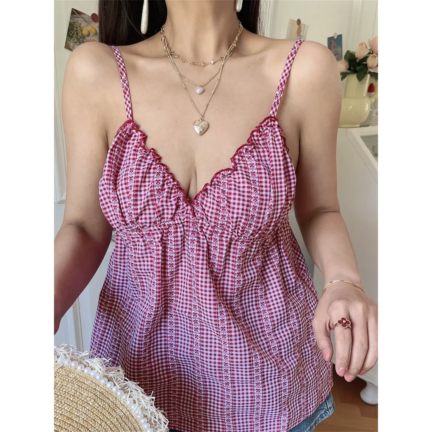 Red white gingham floral cami top women indoor model shot, scalloped v-neck gathered bust loose babydoll fit, matched with denim shorts korean soft daily outfit display