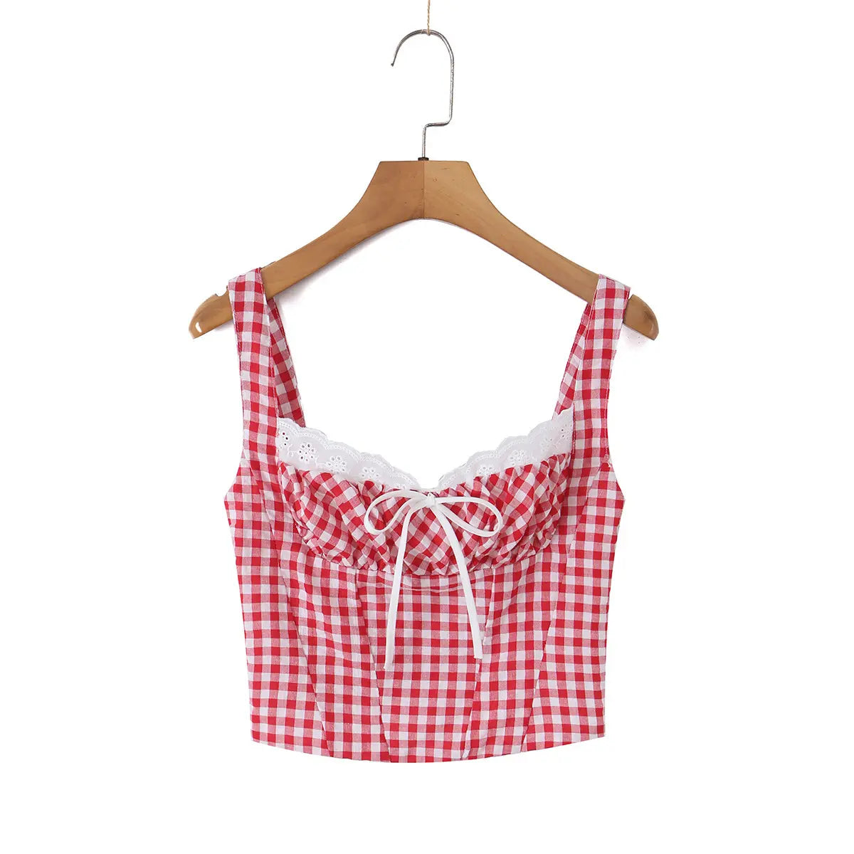 Front view of a red and white gingham bustier tank top hung on a wooden hanger, featuring lace trim, a center bow, and gathered bust.