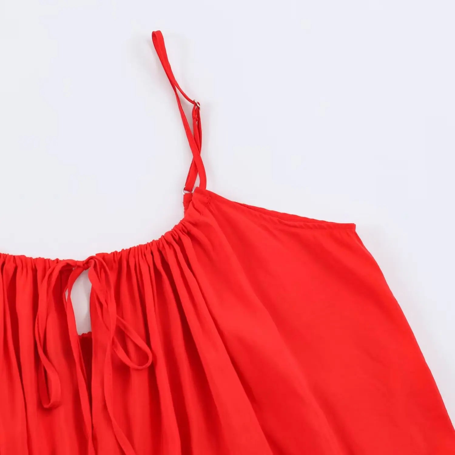 Partial shot of back keyhole cutout and gathered fabric detail