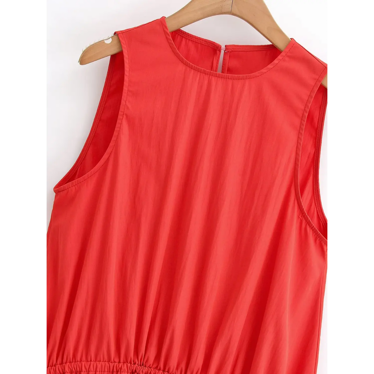 Close‑up of round neck sleeveless bodice and front drawstring waist detail