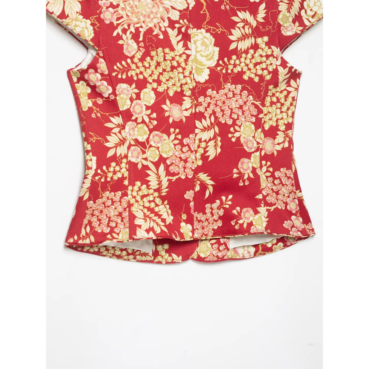 Flat lay lower back view of red oriental floral tailored jacket, fitted waist seams, finished hem and all‑over vintage flower print