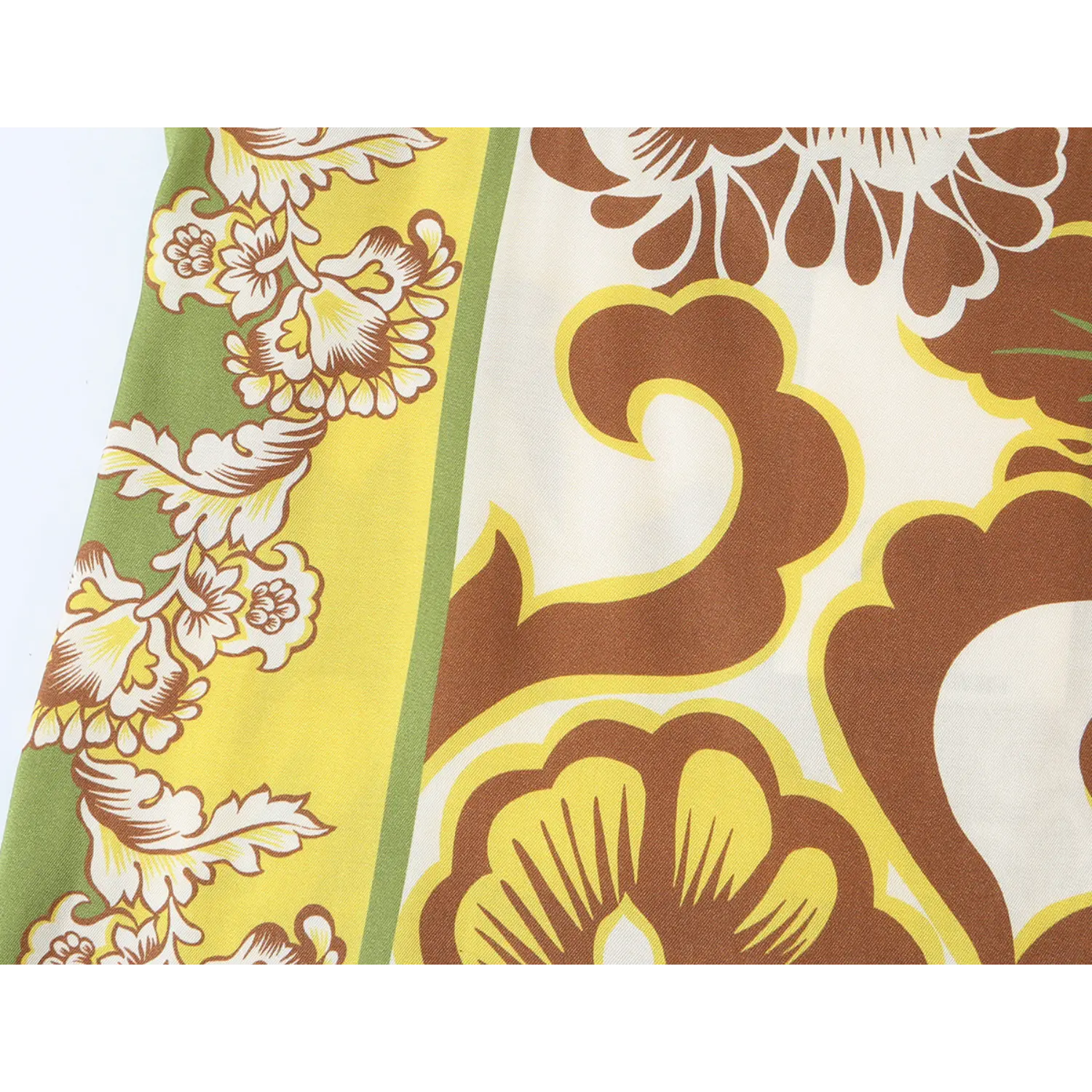Close-up texture of brown yellow green baroque floral patchwork print for summer slip dress