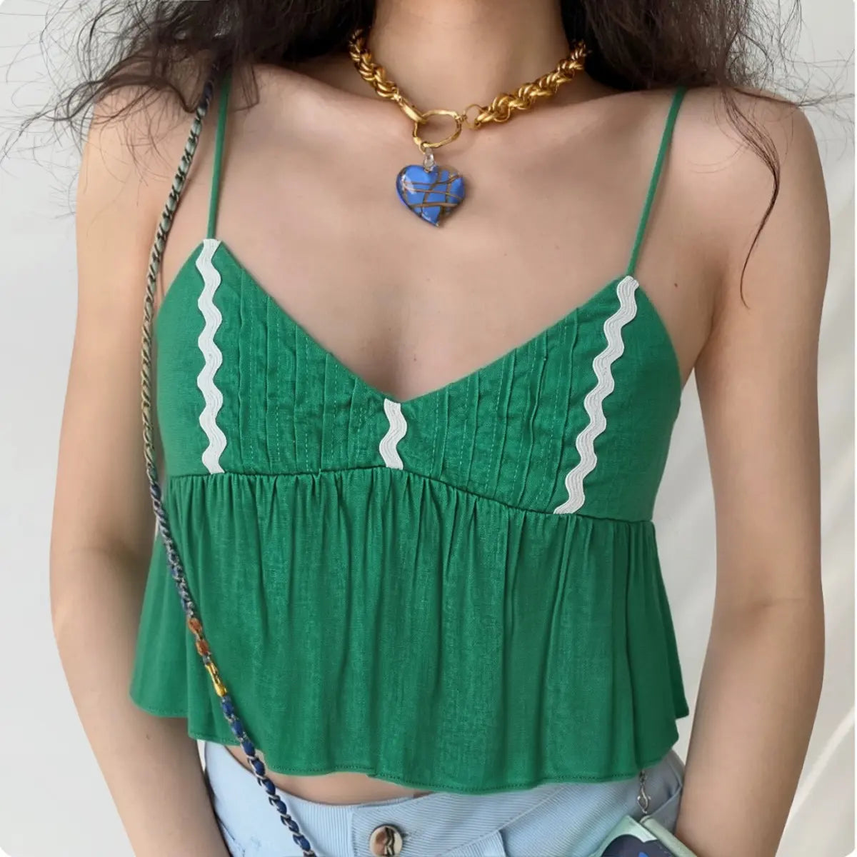 Daily street lifestyle shot vintage ricrac trim cropped green cami top