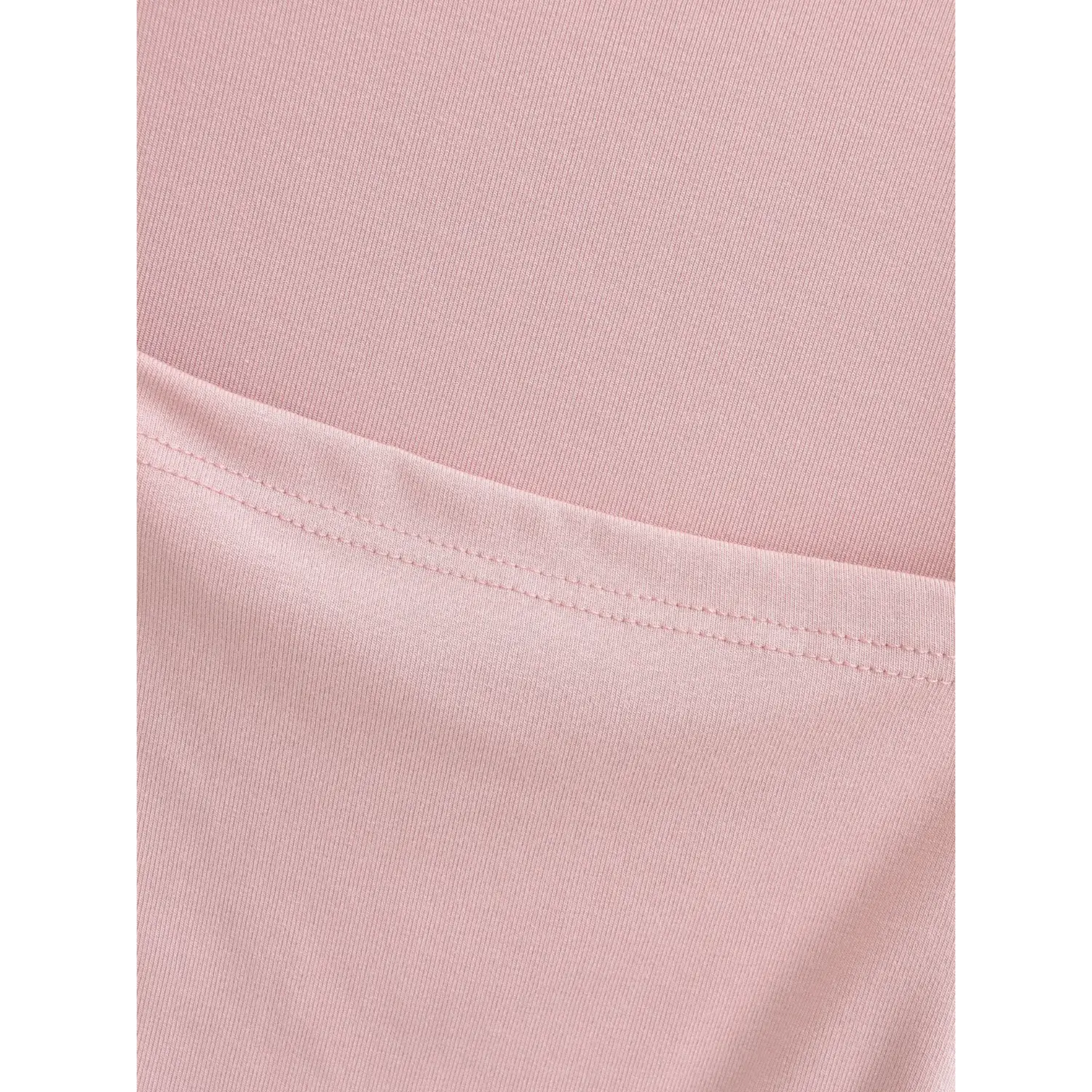 Extreme close-up of fine ribbed knit fabric texture on dusty pink square neck cami top
