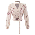 Front flat lay of rose floral choker tie wrap blouse