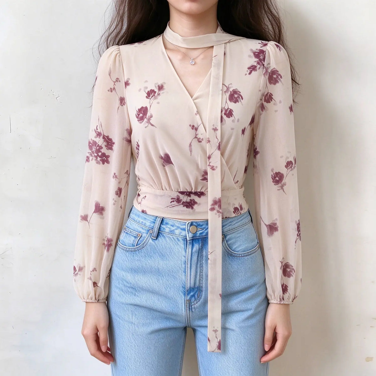 Model wearing rose floral choker tie wrap blouse, front view