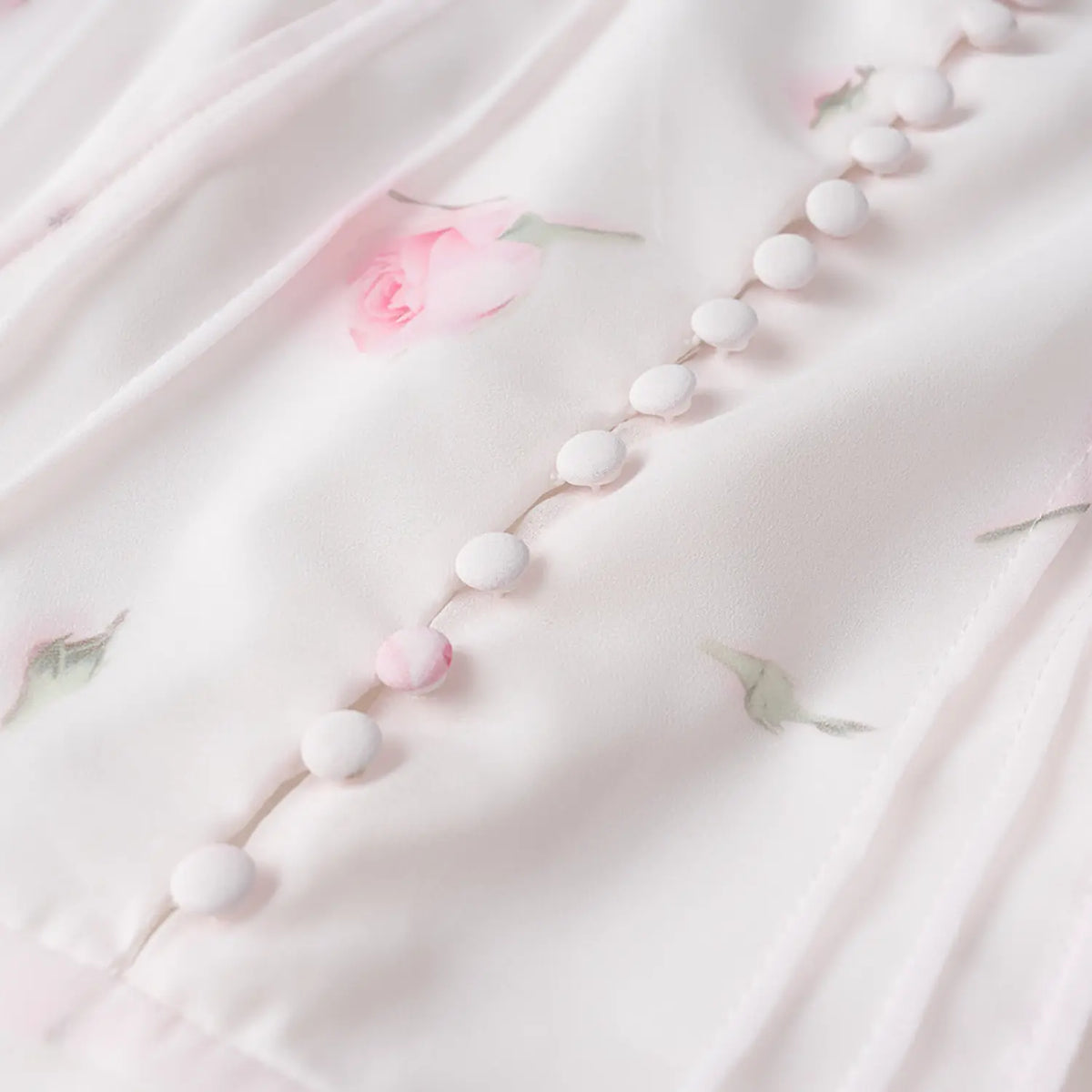 Close-up of fabric-covered button detail