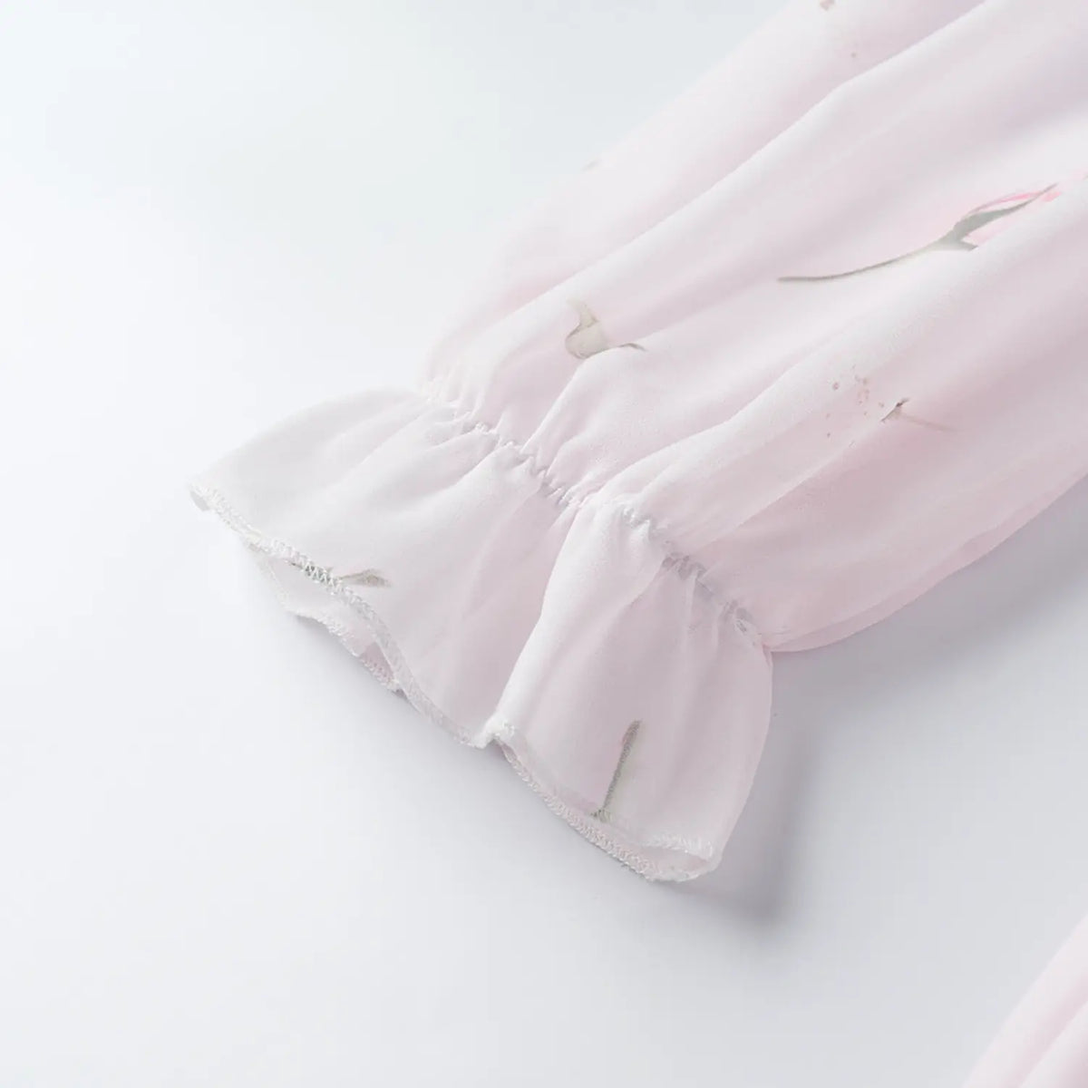 Close-up of ruffle cuff