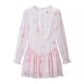 Front flat lay of rose print button front ruffle tiered mini dress