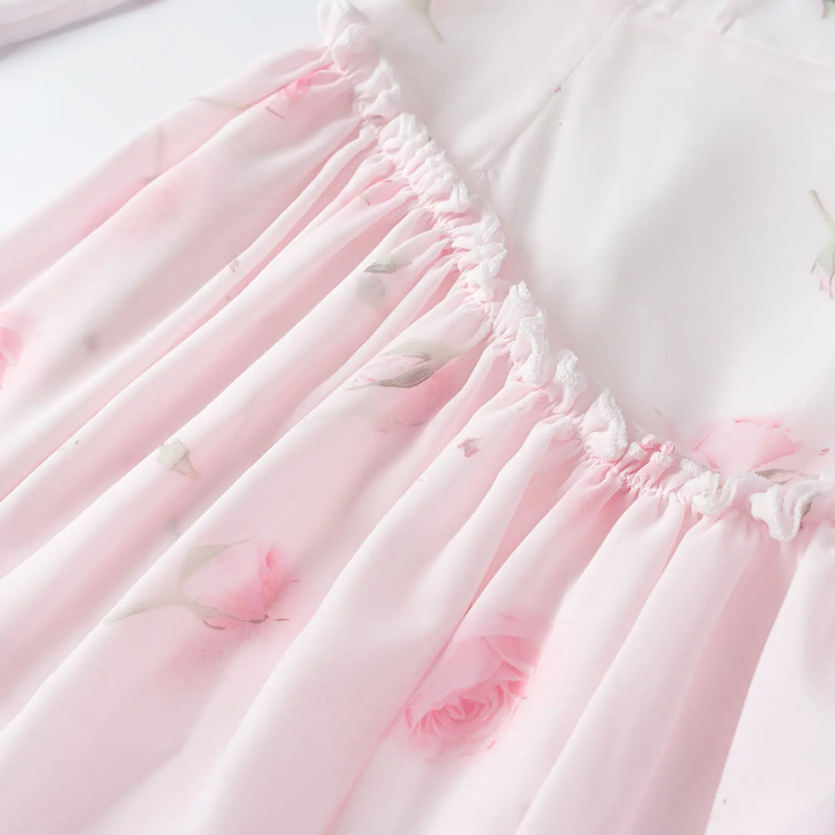 Close-up of ruched ruffle waist seam