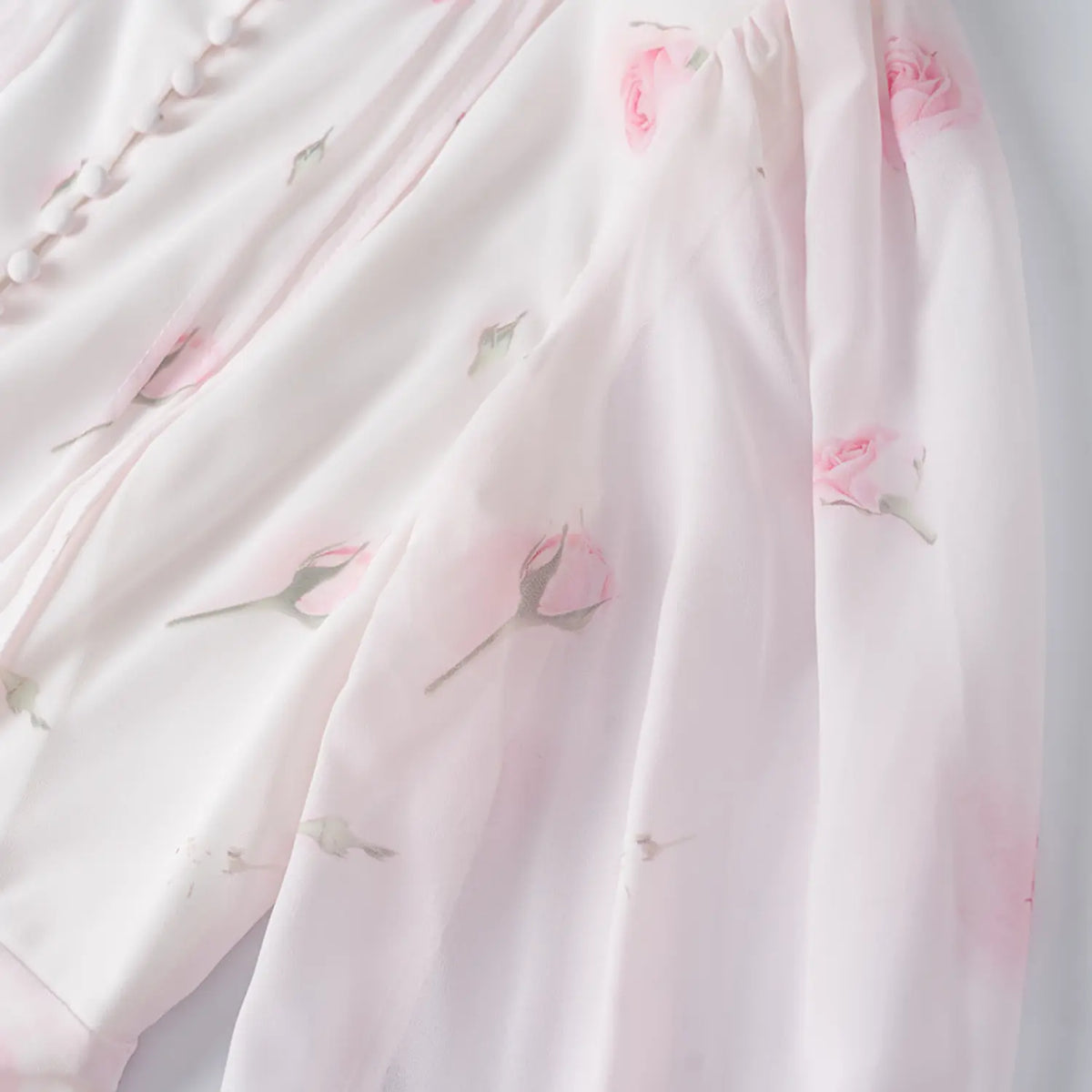 Close-up of puff shoulder and rose print
