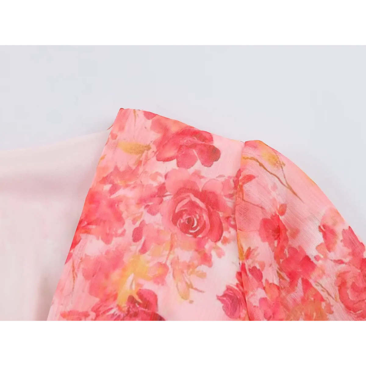 Close-up of shoulder and sleeve floral print
