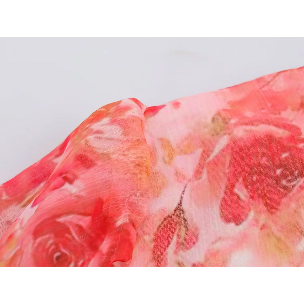 Close-up of long sleeve rose print chiffon fabric