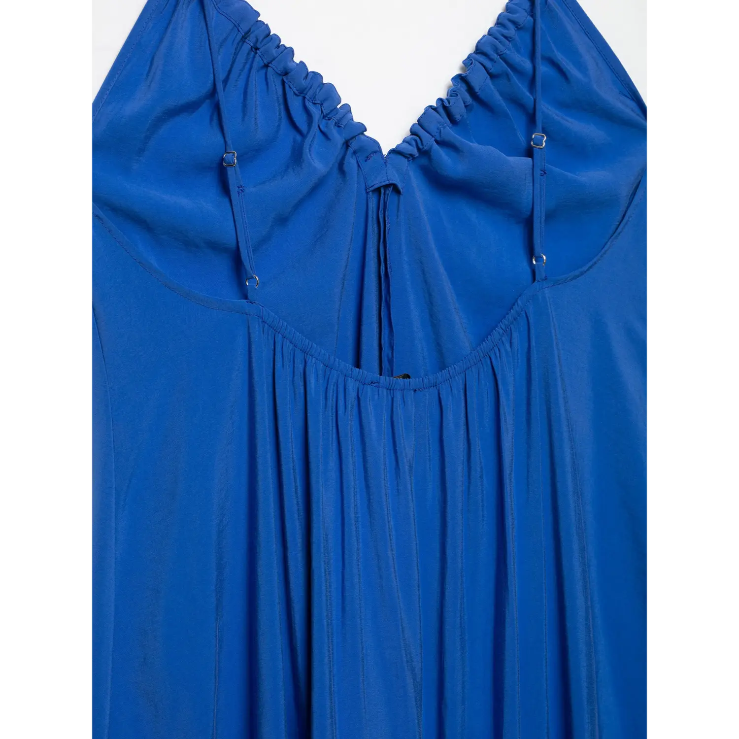 Close‑up of gathered back neckline detail