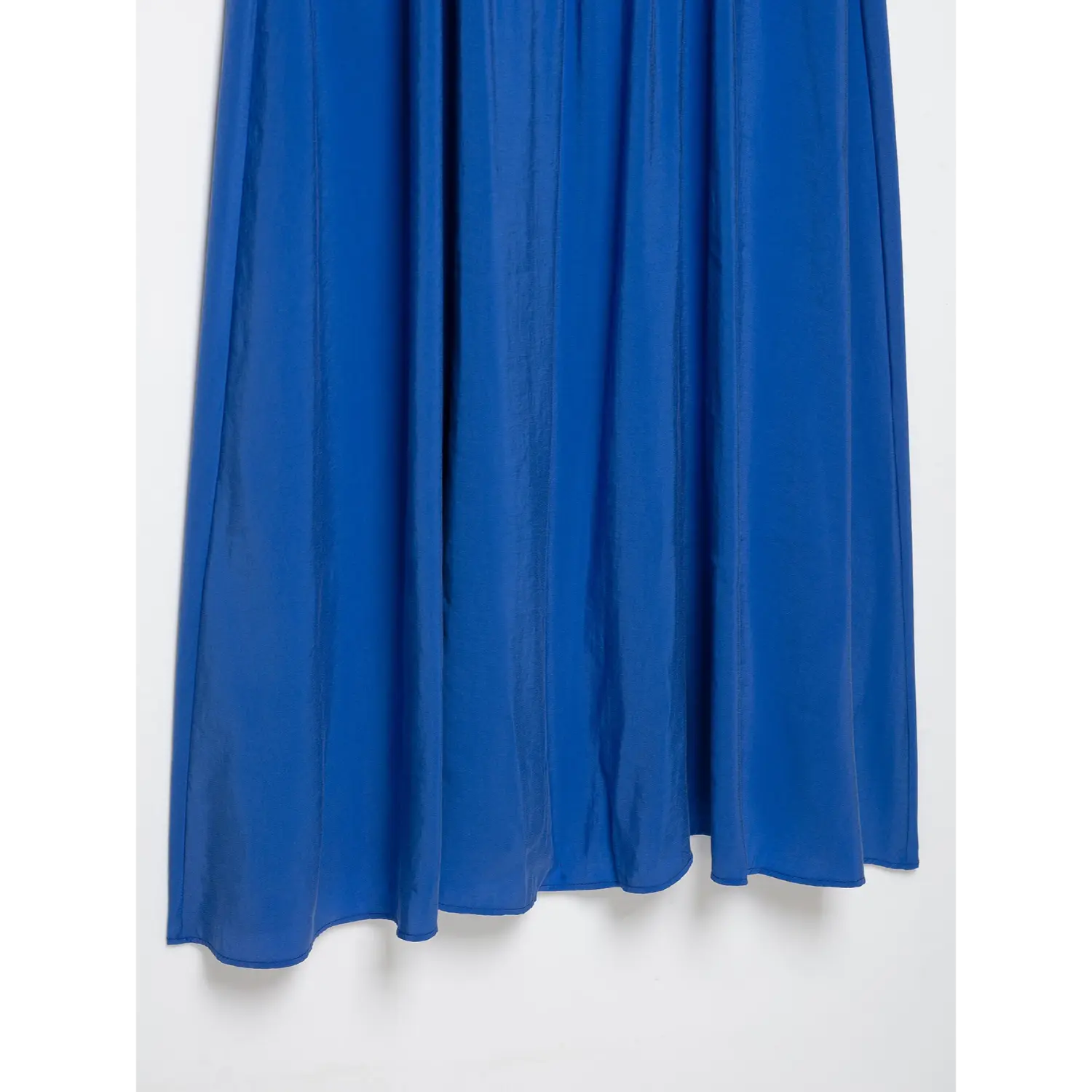 Partial view of loose flowy maxi skirt hem