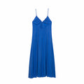 Full flat back view of royal blue spaghetti strap flowy maxi dress