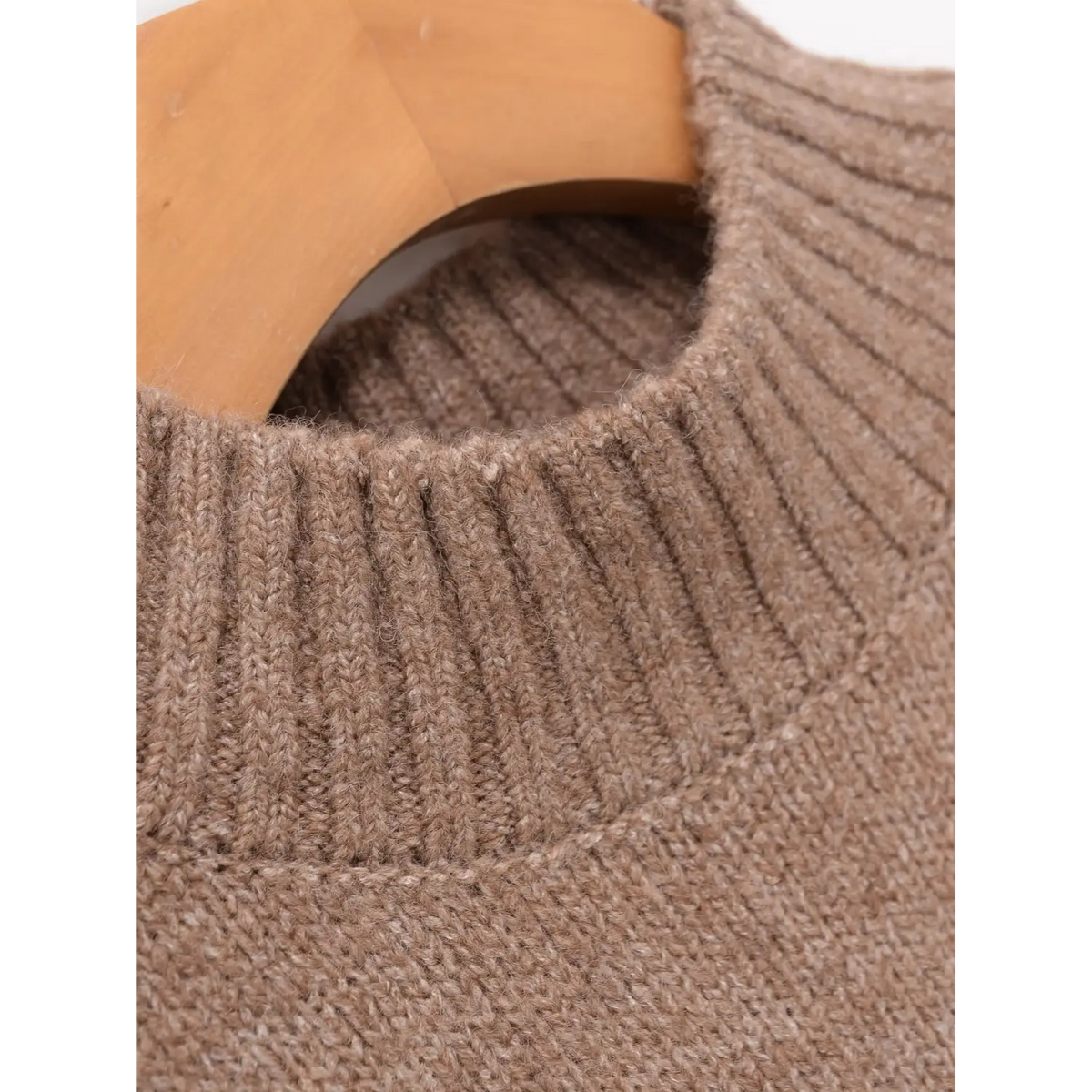 Close-up of oatmeal ribbed mock neck collar