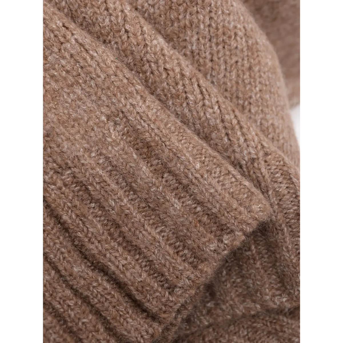 Close-up of oatmeal knit fabric texture