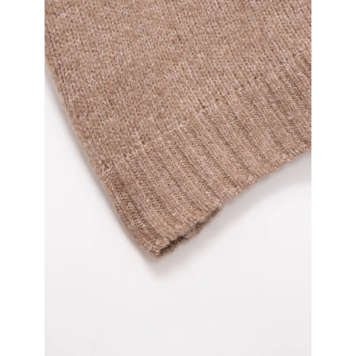 Close-up of oatmeal ribbed hem stitching