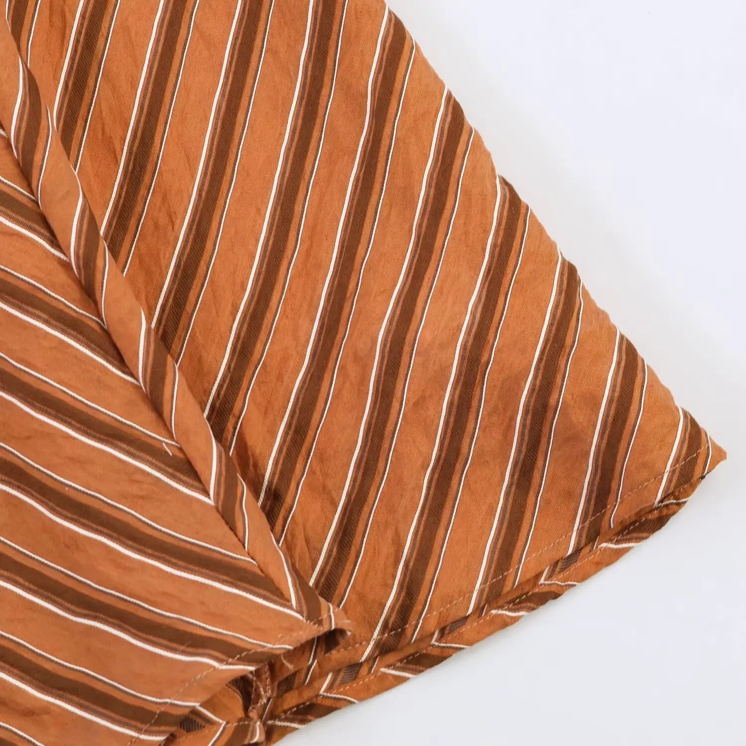 Rust chevron stripe maxi dress skirt folded detail, soft flowy woven fabric