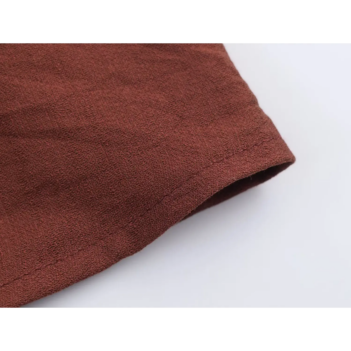 Close-up of midi skirt hem