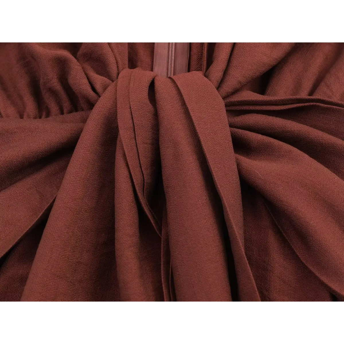 Close-up of front waist tie knot