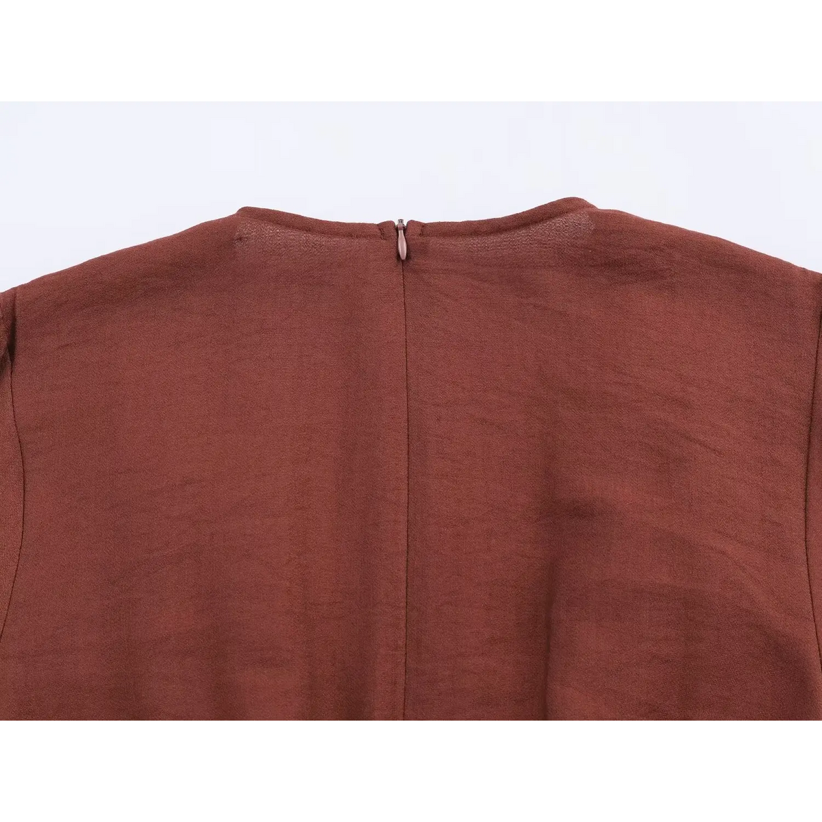 Close-up of back neckline zipper top
