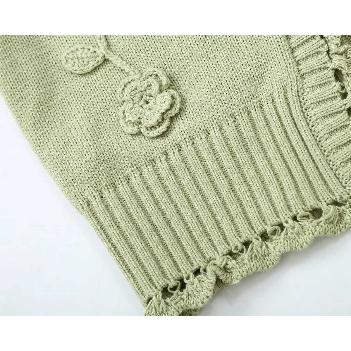Close-up of ribbed hem and scalloped lace edge trim