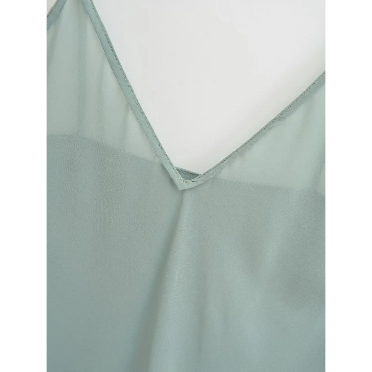 Close-up of slip dress V point stitching