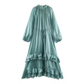 Front flat lay of sage green high neck puff sleeve ruffle hem maxi dress