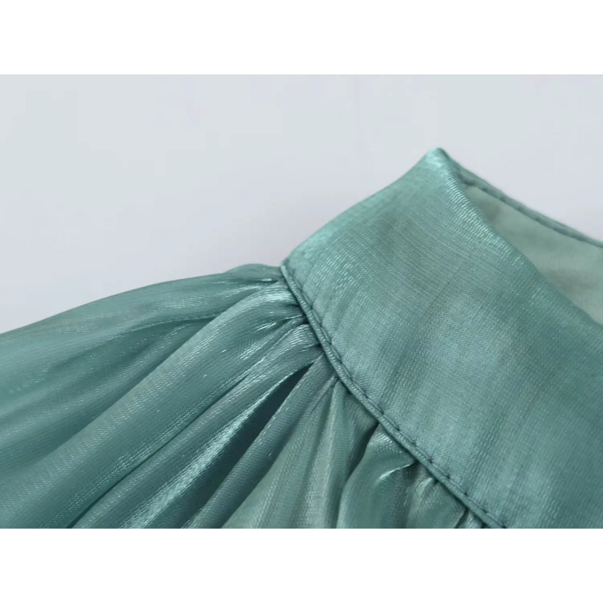 Close-up of neckline stitching