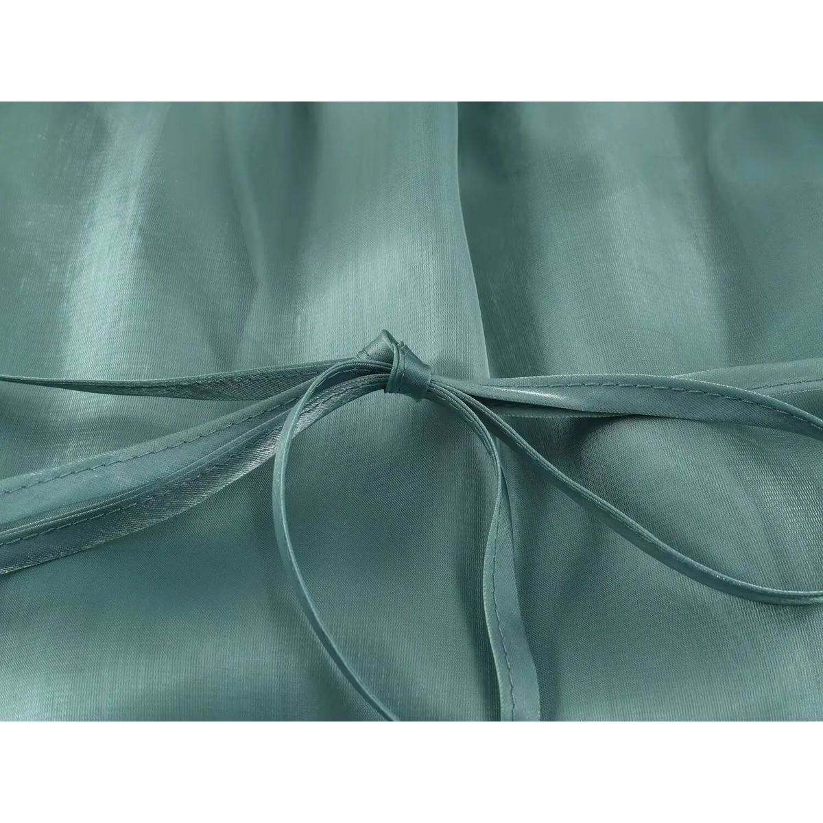 Close-up of waist tie knot