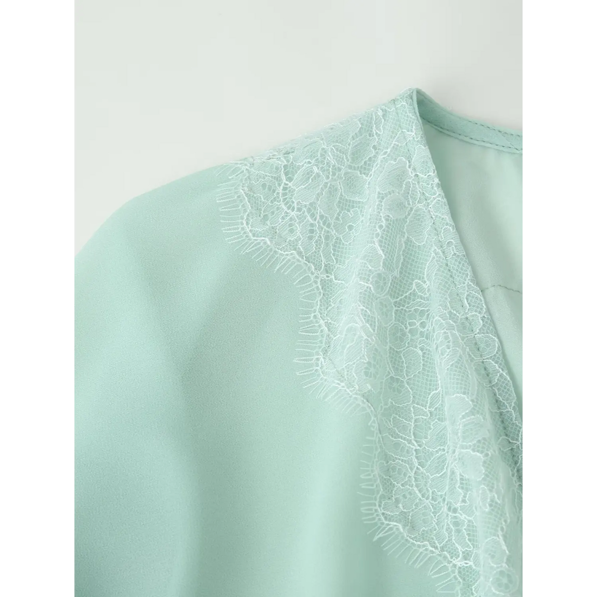 Close-up of shoulder lace detail
