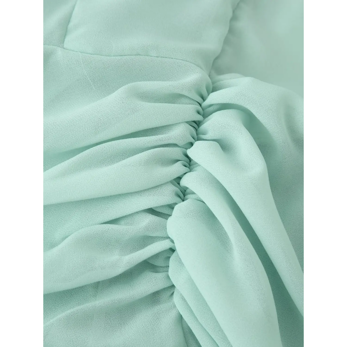 Close-up of draped ruched waist