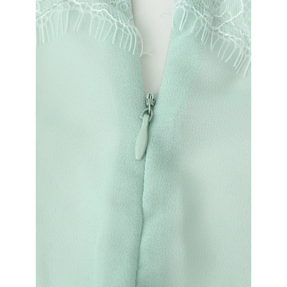 Close-up of back zipper pull