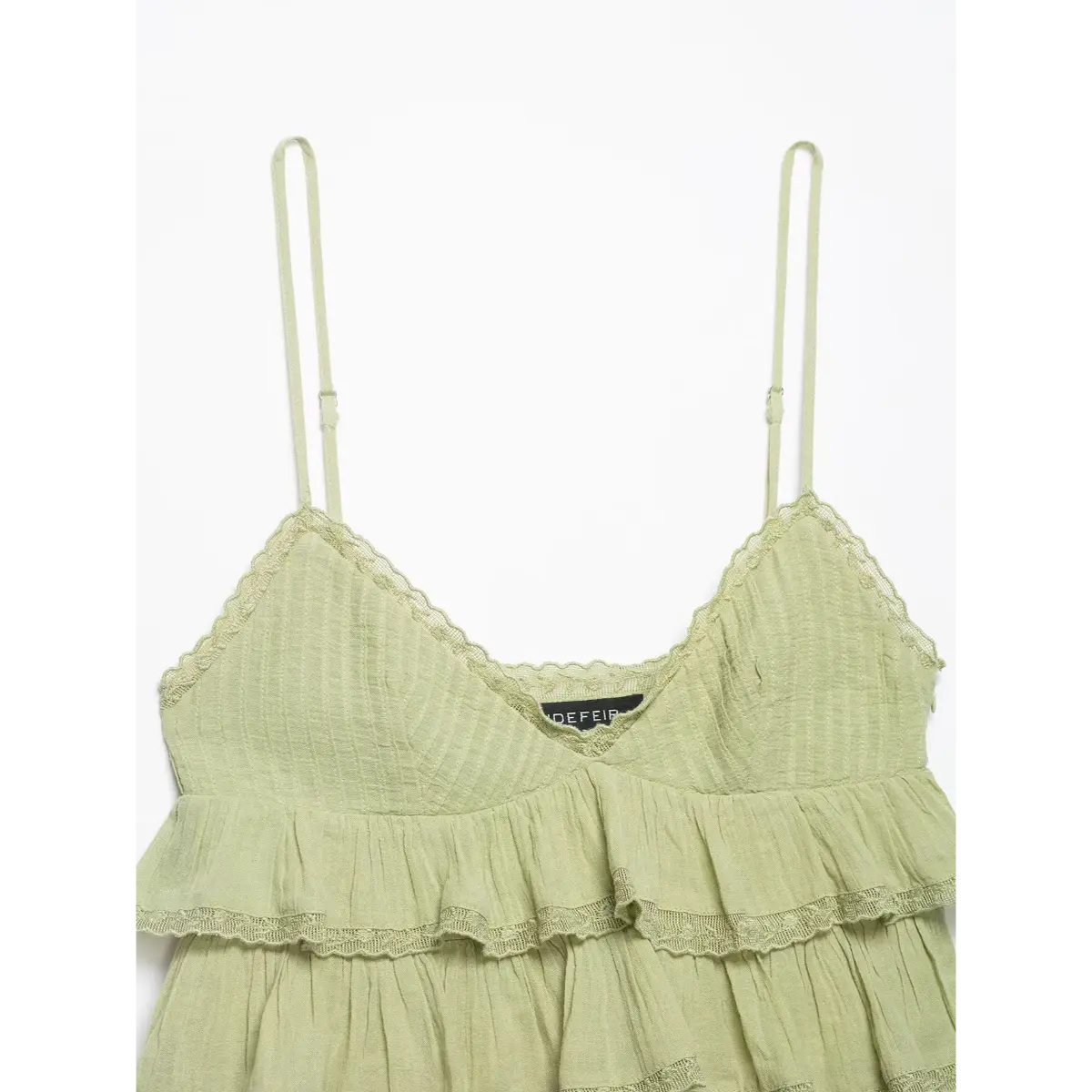 Front view of the cami top, showing the full V-neck, tiered ruffles, and adjustable straps.