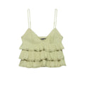 Front view of the cami top, showing the V-neck, textured bodice, and tiered ruffled hem.