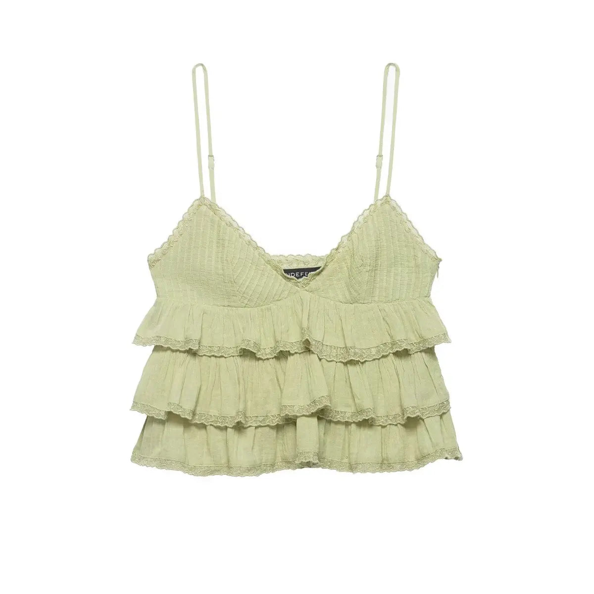 Front view of the cami top, showing the V-neck, textured bodice, and tiered ruffled hem.