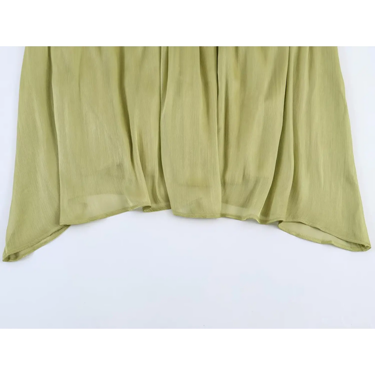 Close-up of midi skirt hem