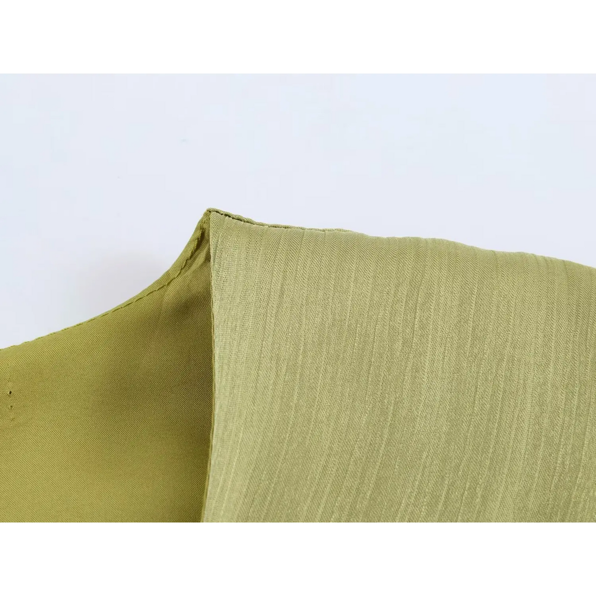 Close-up of shoulder seam and fabric texture