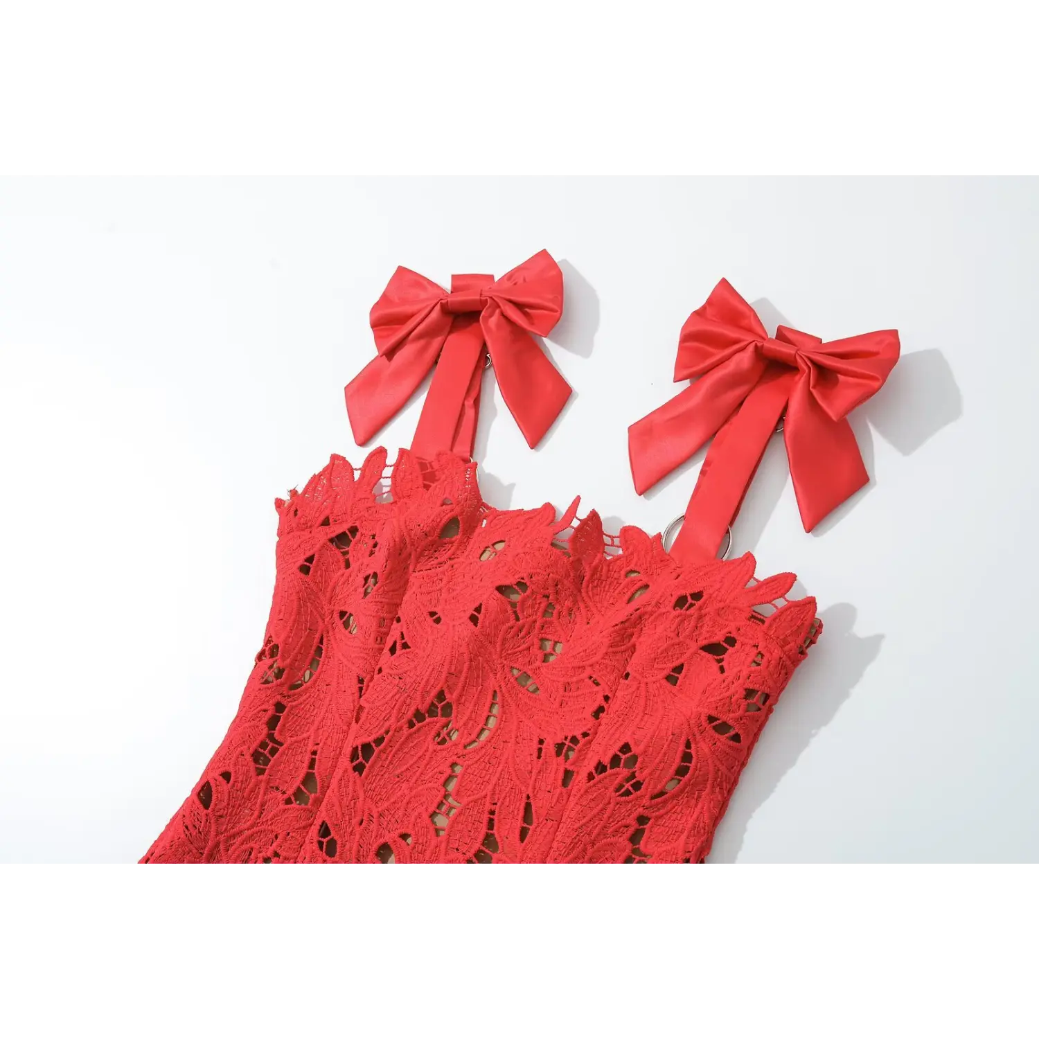 Satin big bow adjustable strap macro close-up, metal O ring slider buckle matching glossy ribbon detachable bow shoulder craft shot