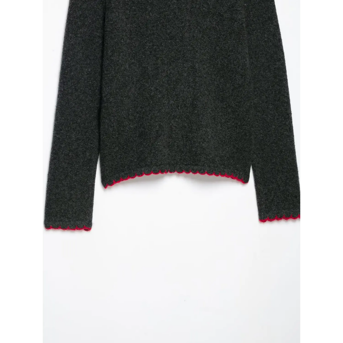 Close-up of back hem with red scalloped edge