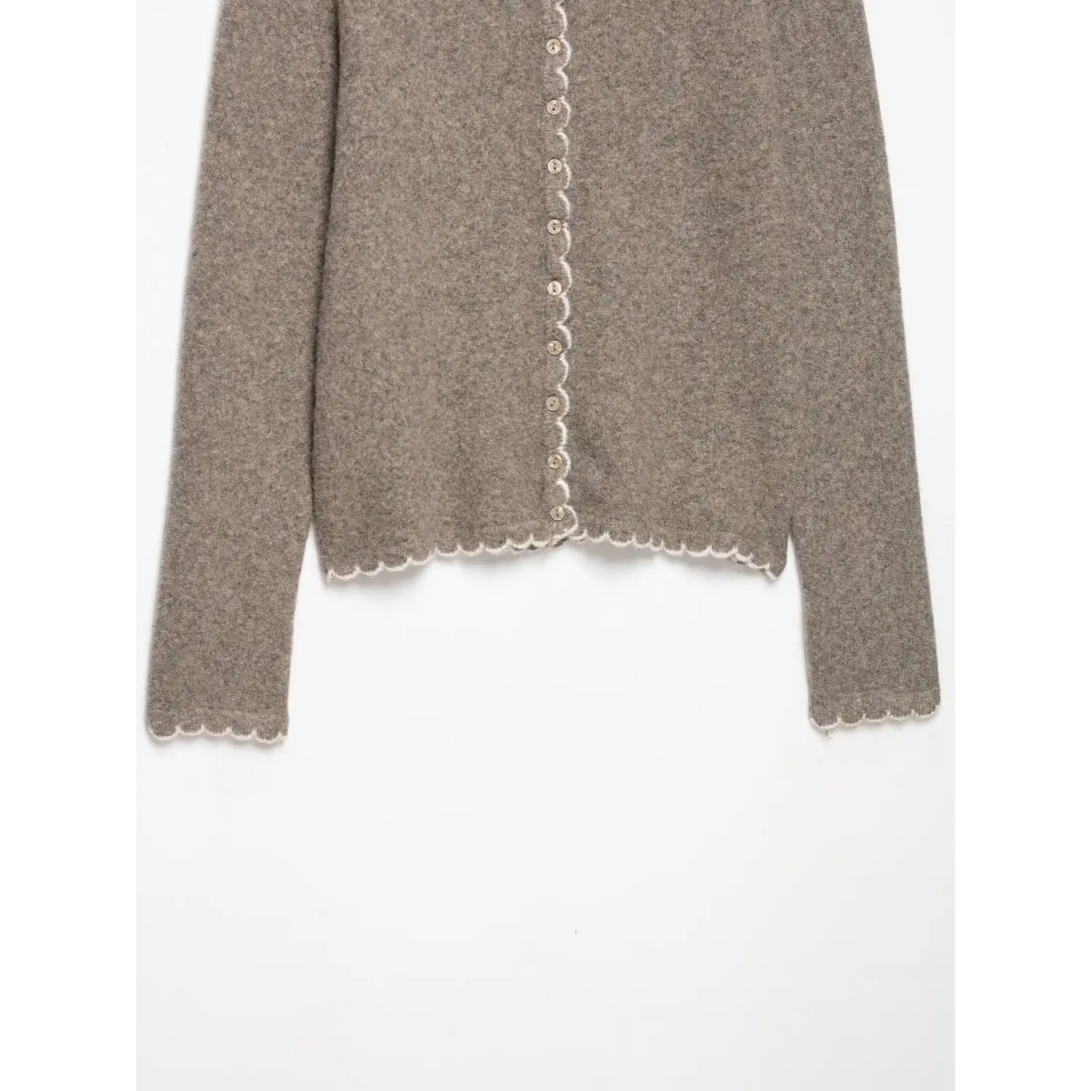 Oatmeal cardigan hem and sleeves with white scalloped edge