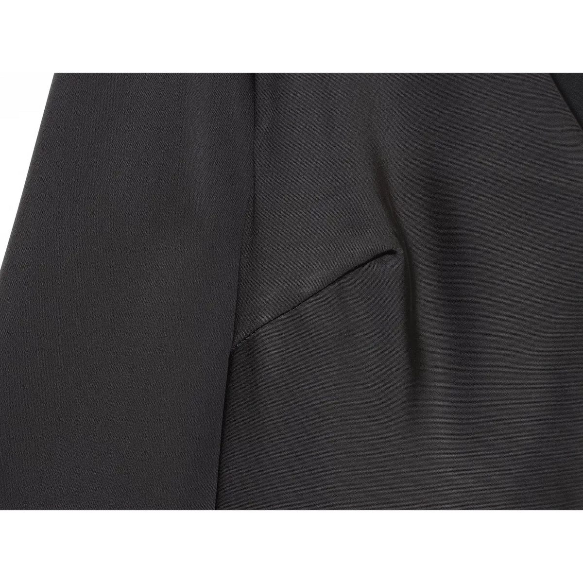 Close-up of black underbust dart detail