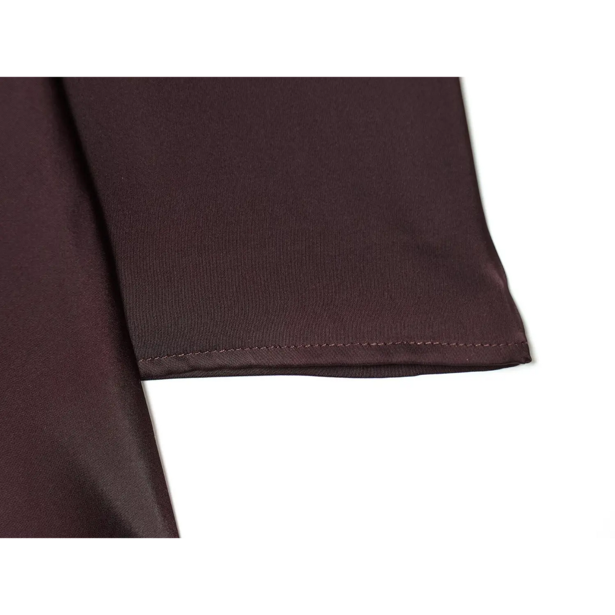 Close-up of burgundy flared cuff stitching