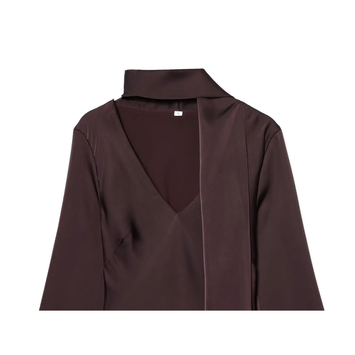 Close-up of burgundy deep V neckline and draped scarf tie