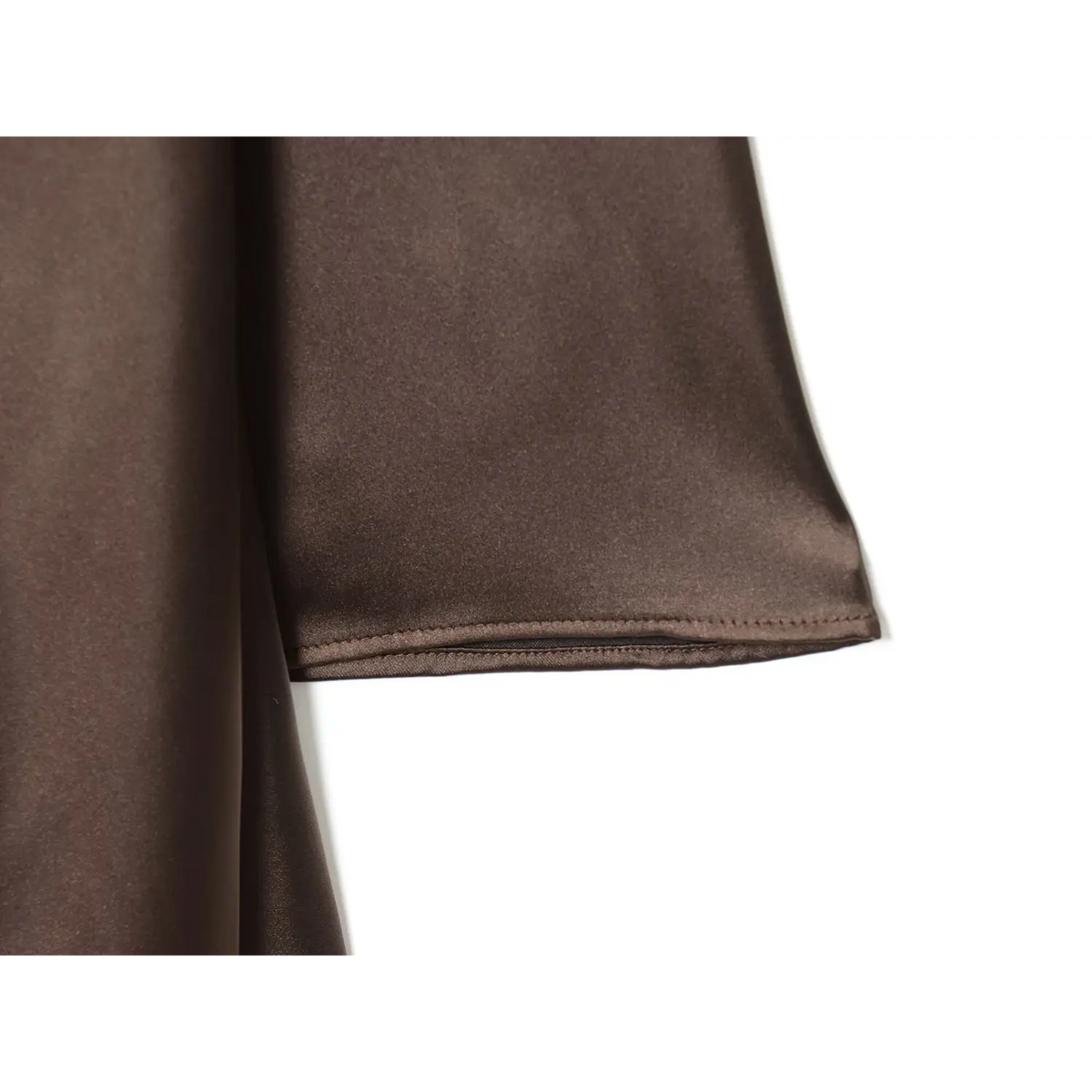 Close-up of mocha brown flared cuff stitching